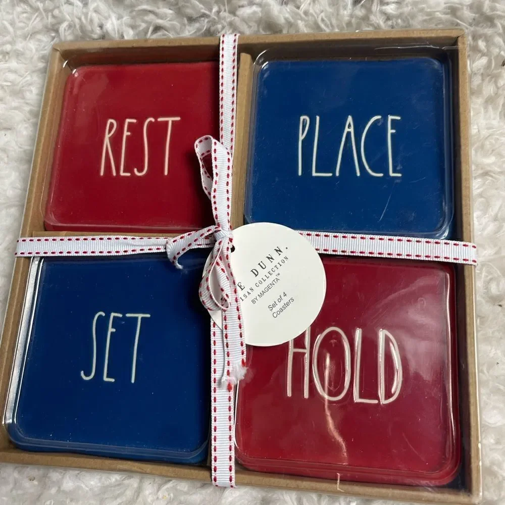 New in box Rae Dunn Ceramic Red & Blue Rest, Place, Stay, Hold Coasters .